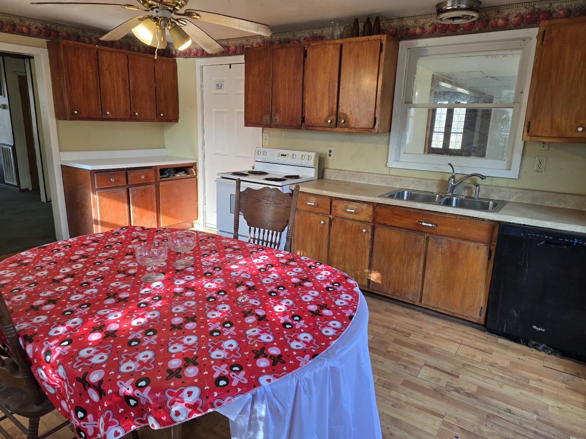 601 Anglin Ridge Road Dover, TN 37058 - Photo 9 of 30 a kitchen with a sink cabinets and wooden floor