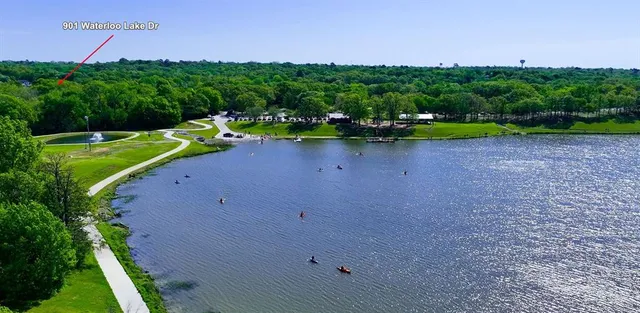 a view of a field with sitting area