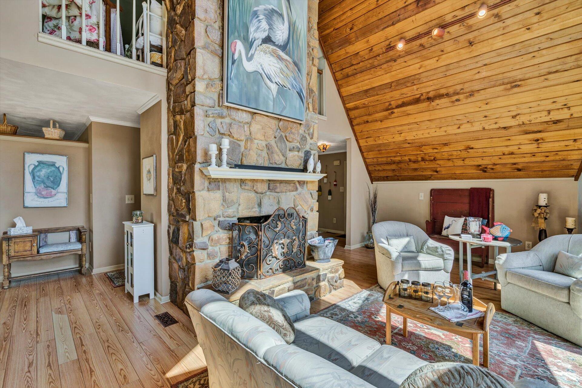 2339 Navigation Point Goodview, VA 24095 - Photo 11 of 49 a living room with furniture and a wooden floor