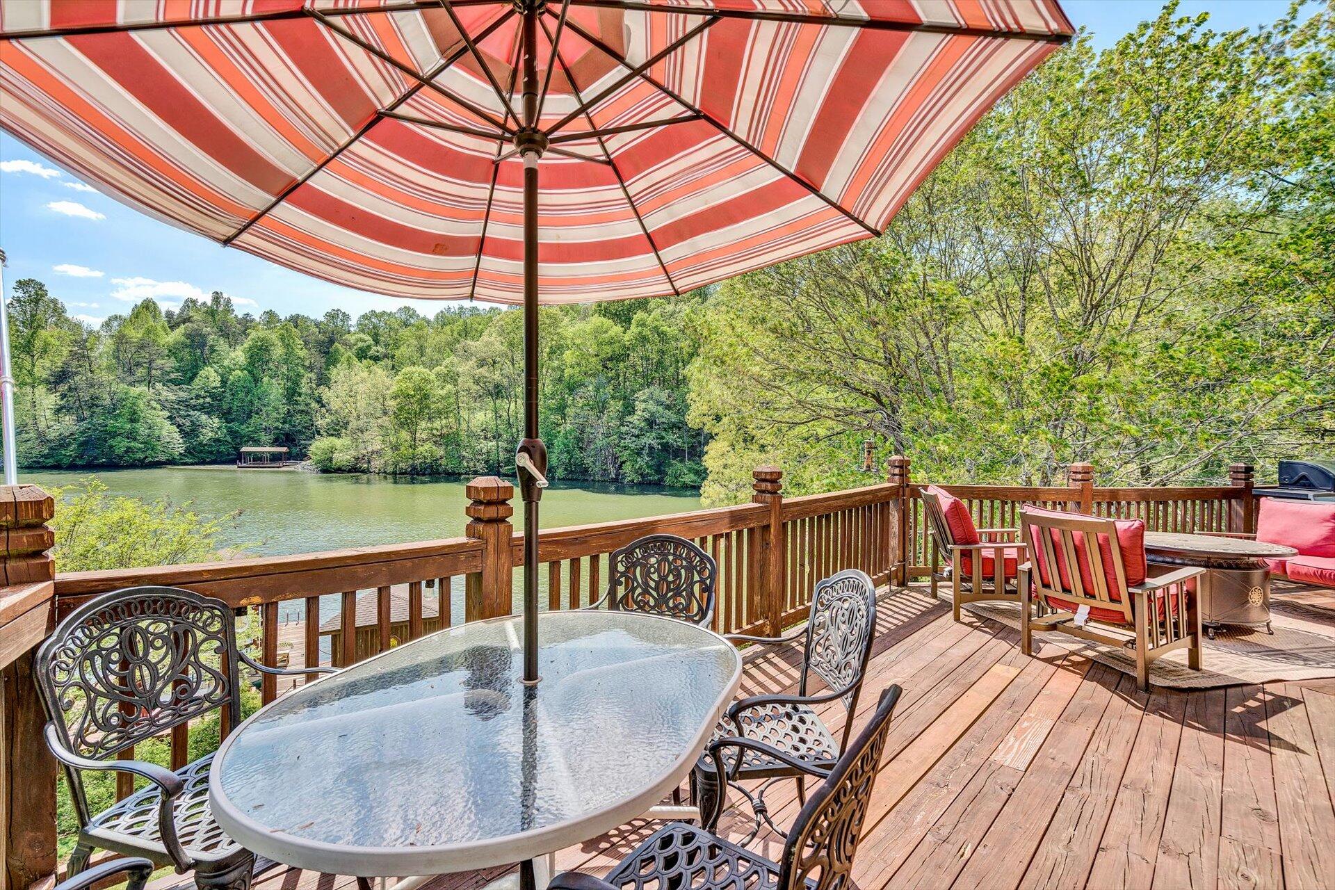 2339 Navigation Point Goodview, VA 24095 - Photo 17 of 49 a view of a wooden deck with furniture