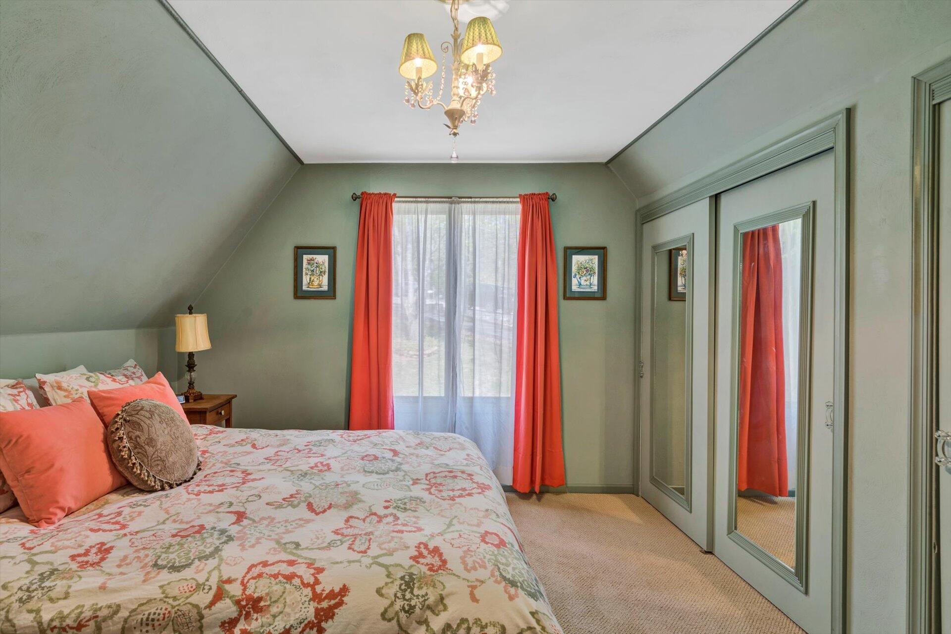 2339 Navigation Point Goodview, VA 24095 - Photo 27 of 49 a bedroom with a large bed and a chandelier