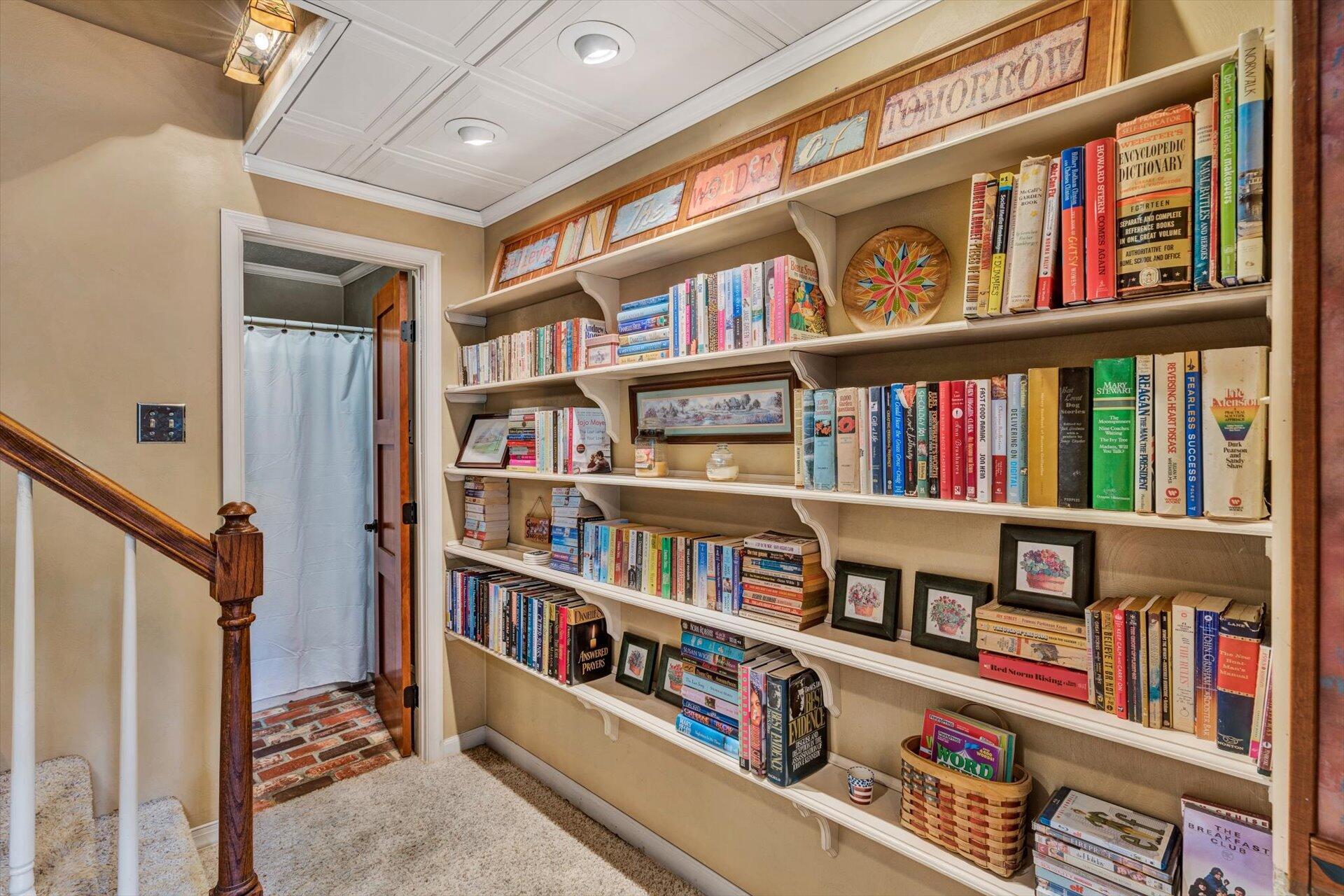 2339 Navigation Point Goodview, VA 24095 - Photo 31 of 49 a book shelf with books in a shelf