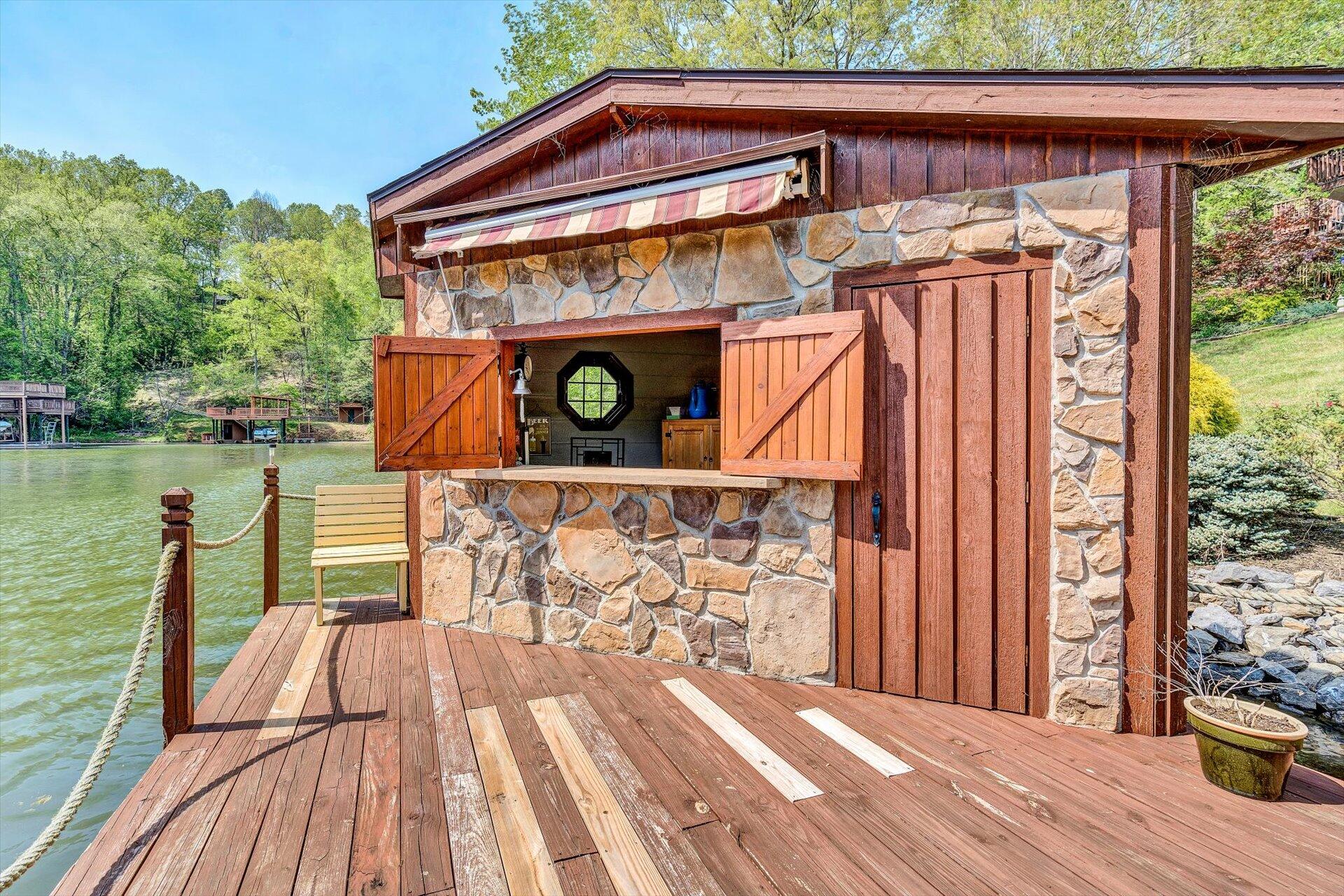 2339 Navigation Point Goodview, VA 24095 - Photo 42 of 49 a view of a wooden deck with a lake view