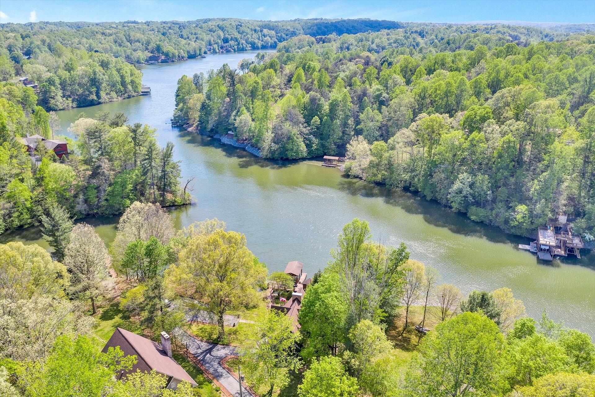 2339 Navigation Point Goodview, VA 24095 - Photo 45 of 49 an aerial view of lake residential house with swimming pool and green space
