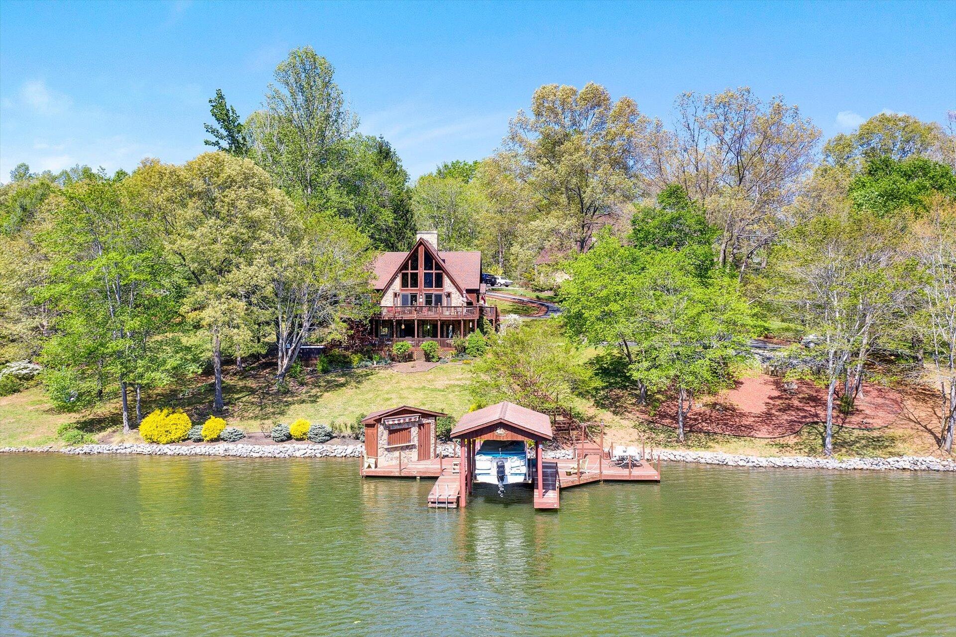 2339 Navigation Point Goodview, VA 24095 - Photo 47 of 49 a view of a lake with houses in the background