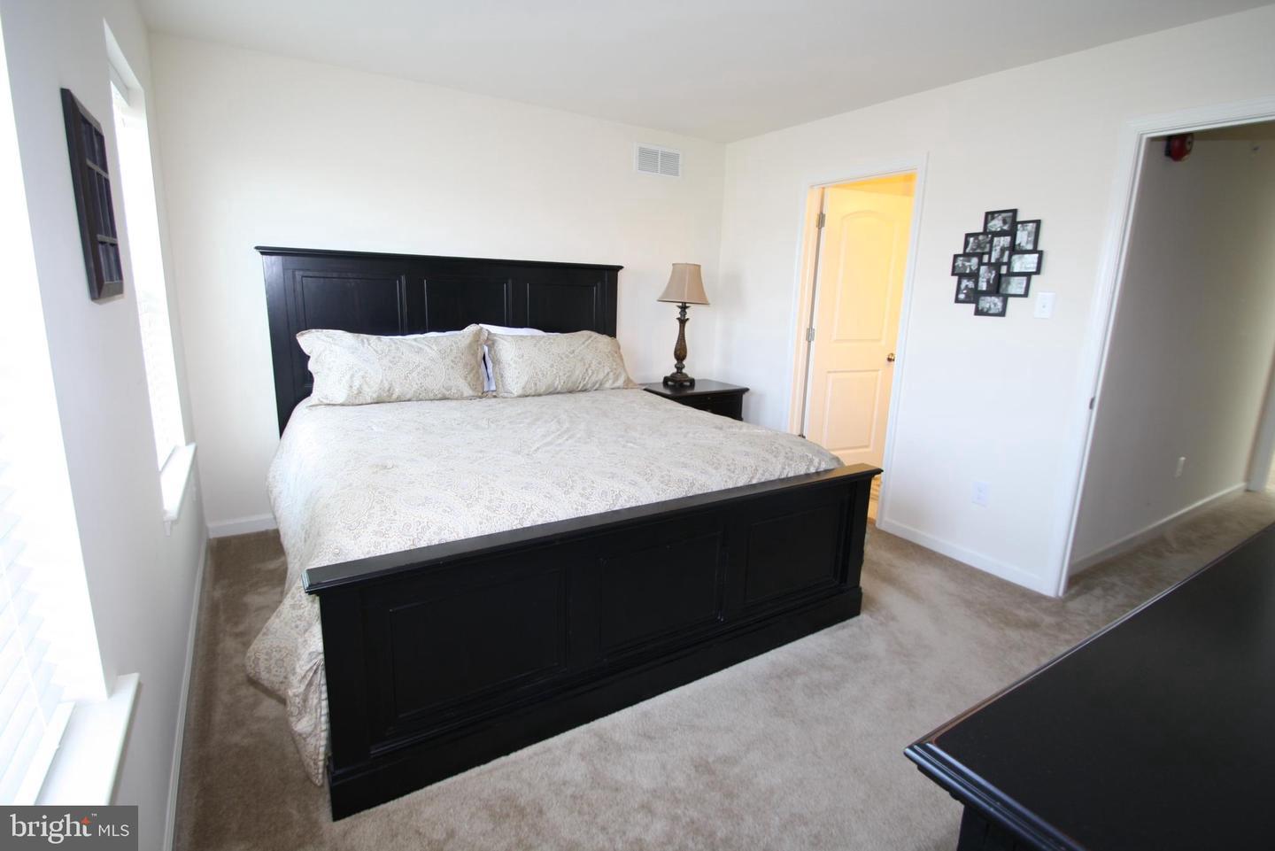 3753 Jacob Stout Road, Unit 12 Doylestown, PA 18902 - Photo 4 of 13 Main bedroom with natural light.