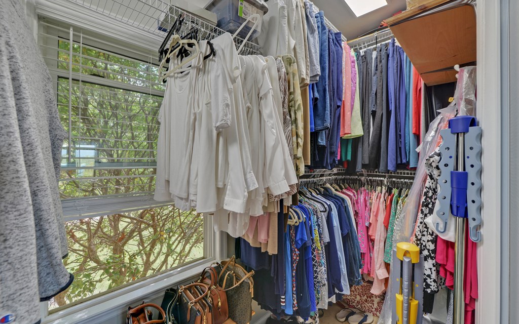 280 Cherokee Court Ellijay, GA 30540 - Photo 19 of 73 a view of walk in closet with clothes