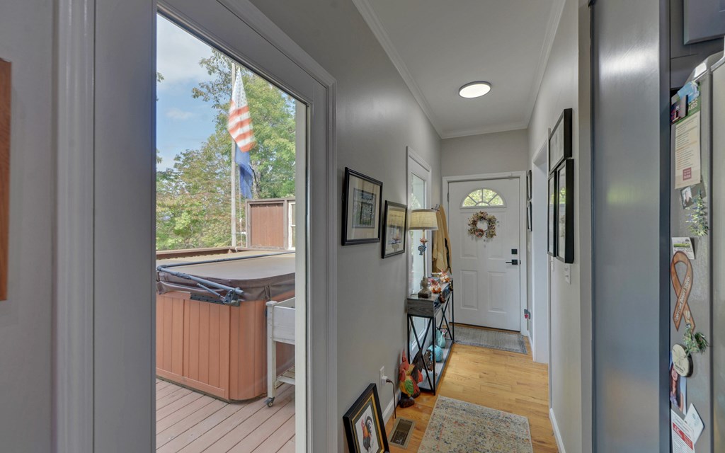 280 Cherokee Court Ellijay, GA 30540 - Photo 20 of 73 a view of a hallway with wooden floor and windows