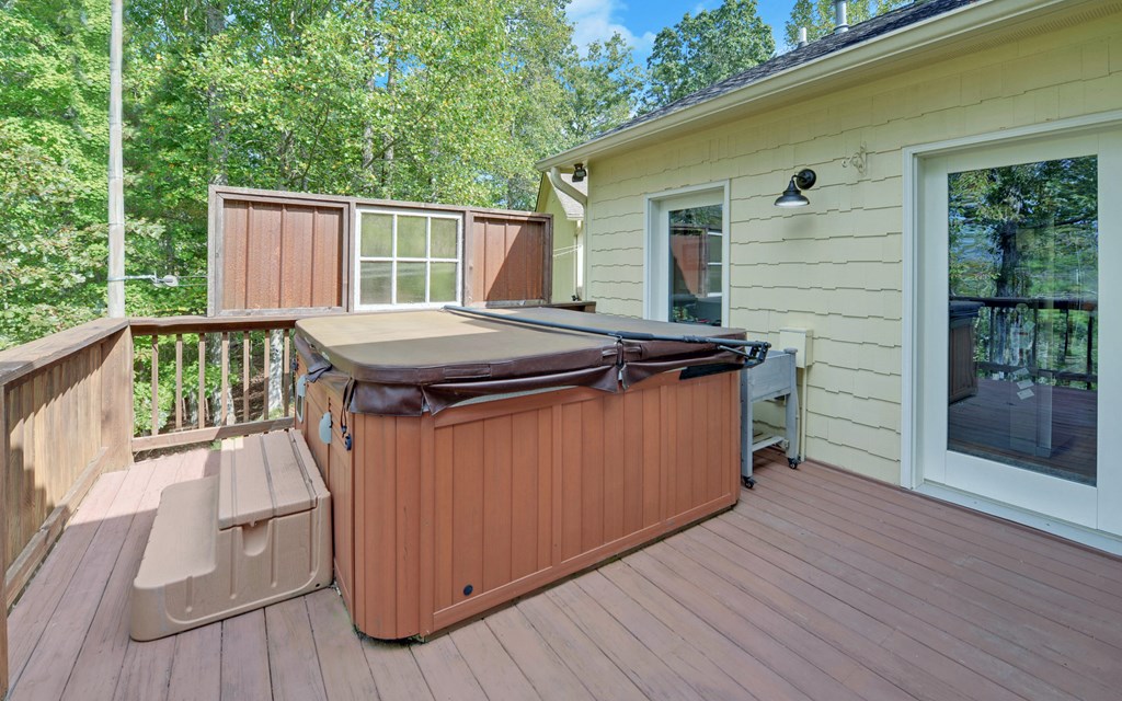 280 Cherokee Court Ellijay, GA 30540 - Photo 29 of 73 a view of a wooden deck and a backyard