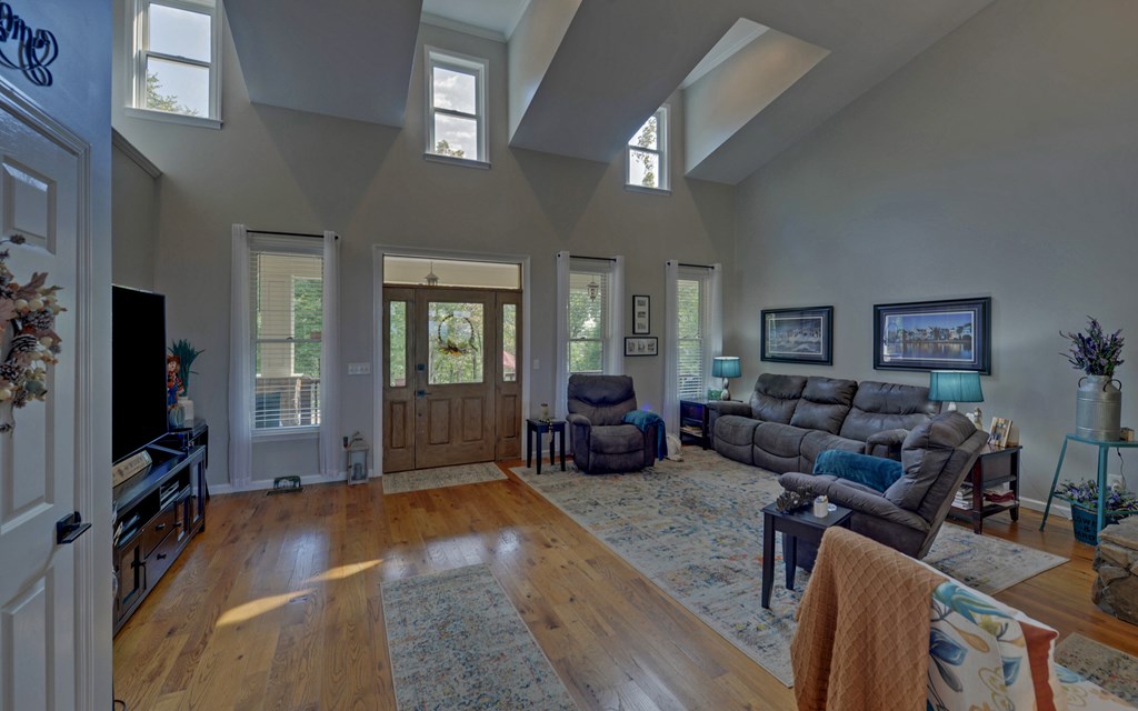 280 Cherokee Court Ellijay, GA 30540 - Photo 3 of 73 a living room with furniture and a flat screen tv