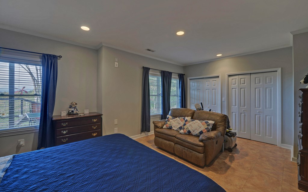 280 Cherokee Court Ellijay, GA 30540 - Photo 42 of 73 a living room with furniture and a flat screen tv