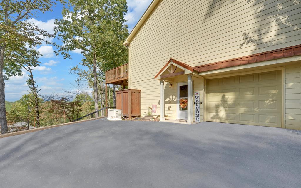 280 Cherokee Court Ellijay, GA 30540 - Photo 51 of 73 a view of a house with a patio