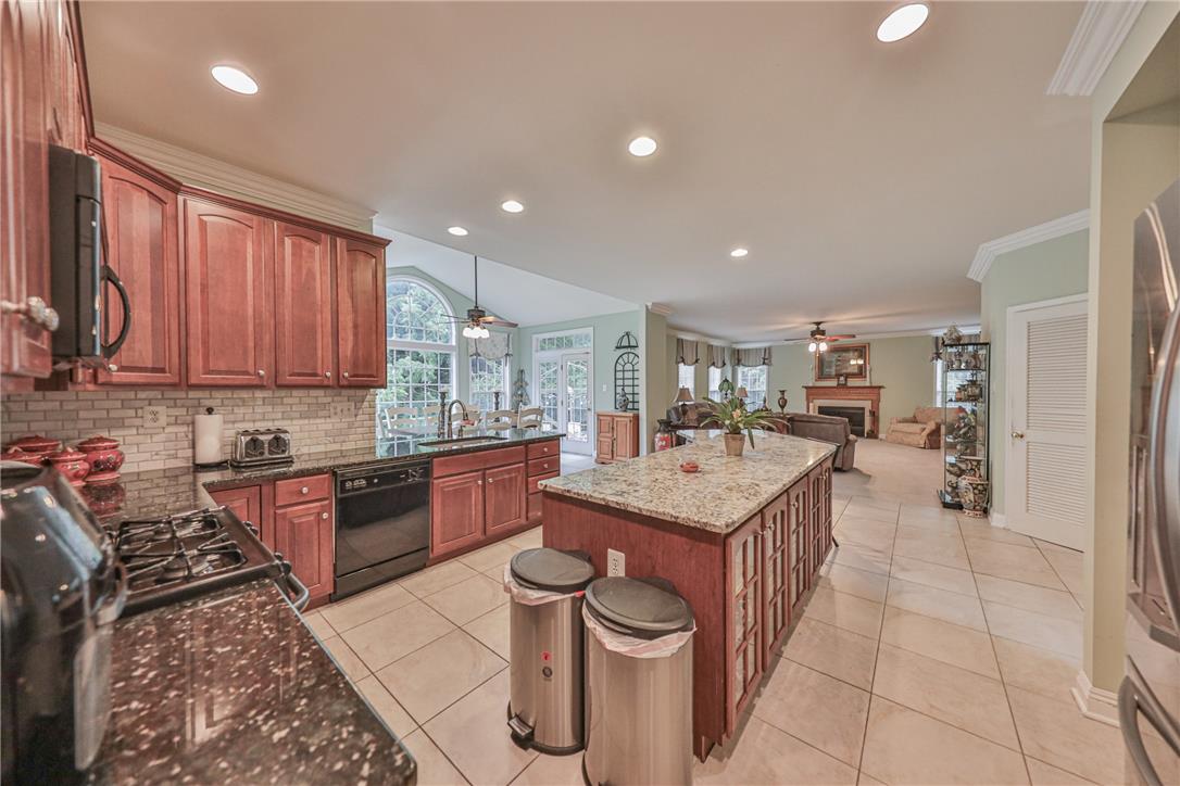 138 Clover Hollow Road Easton, PA 18045 - Photo 17 of 95 An open-concept kitchen boasts a functional island and overlooks a spacious living area.