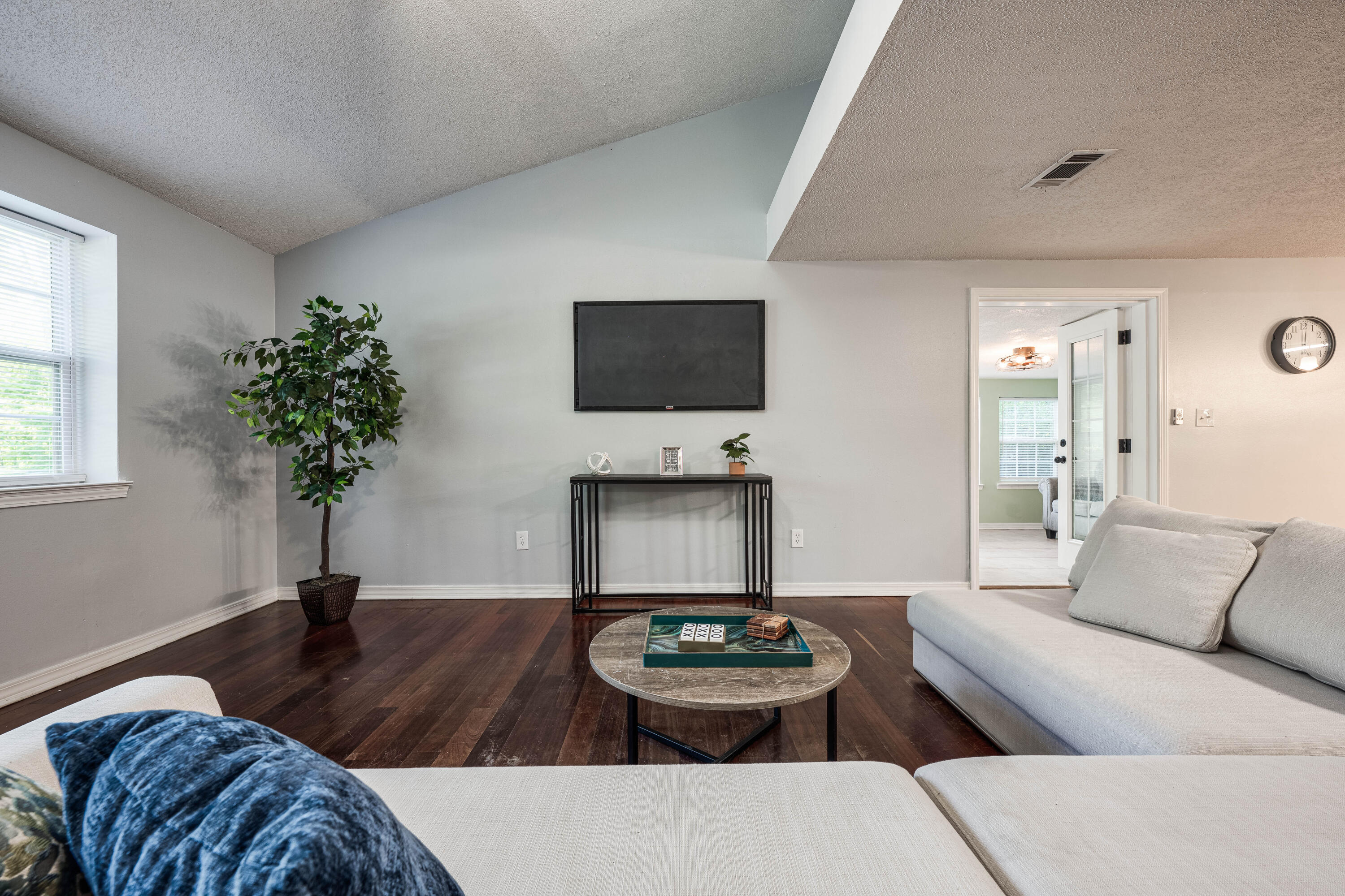 1838 Wadsworth Road Baker, FL 32531 - Photo 16 of 71 a living room with furniture and a potted plant