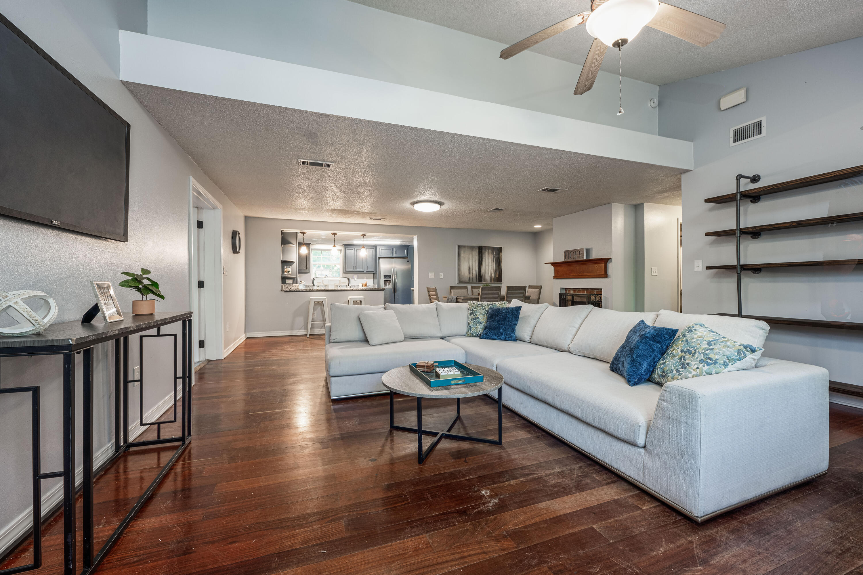 1838 Wadsworth Road Baker, FL 32531 - Photo 2 of 71 a living room with furniture and view of kitchen