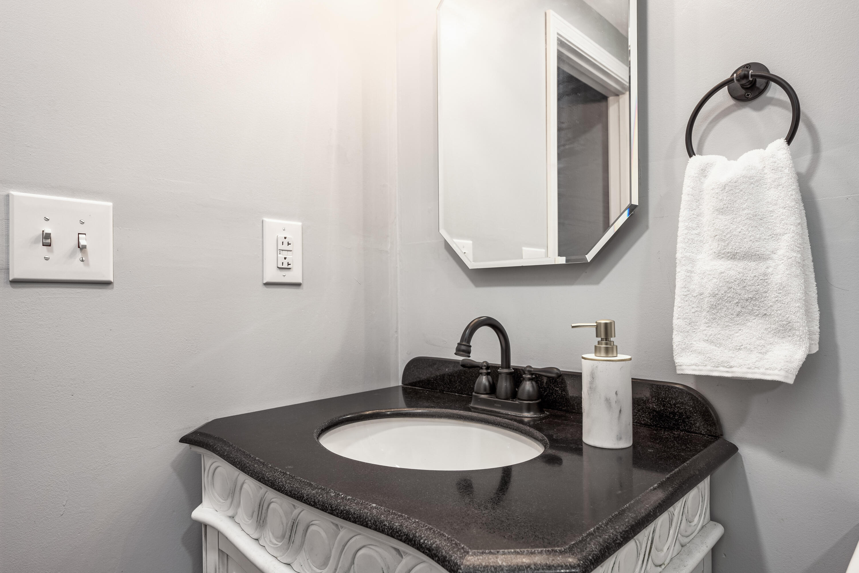 1838 Wadsworth Road Baker, FL 32531 - Photo 35 of 71 a bathroom with a granite countertop sink and a mirror