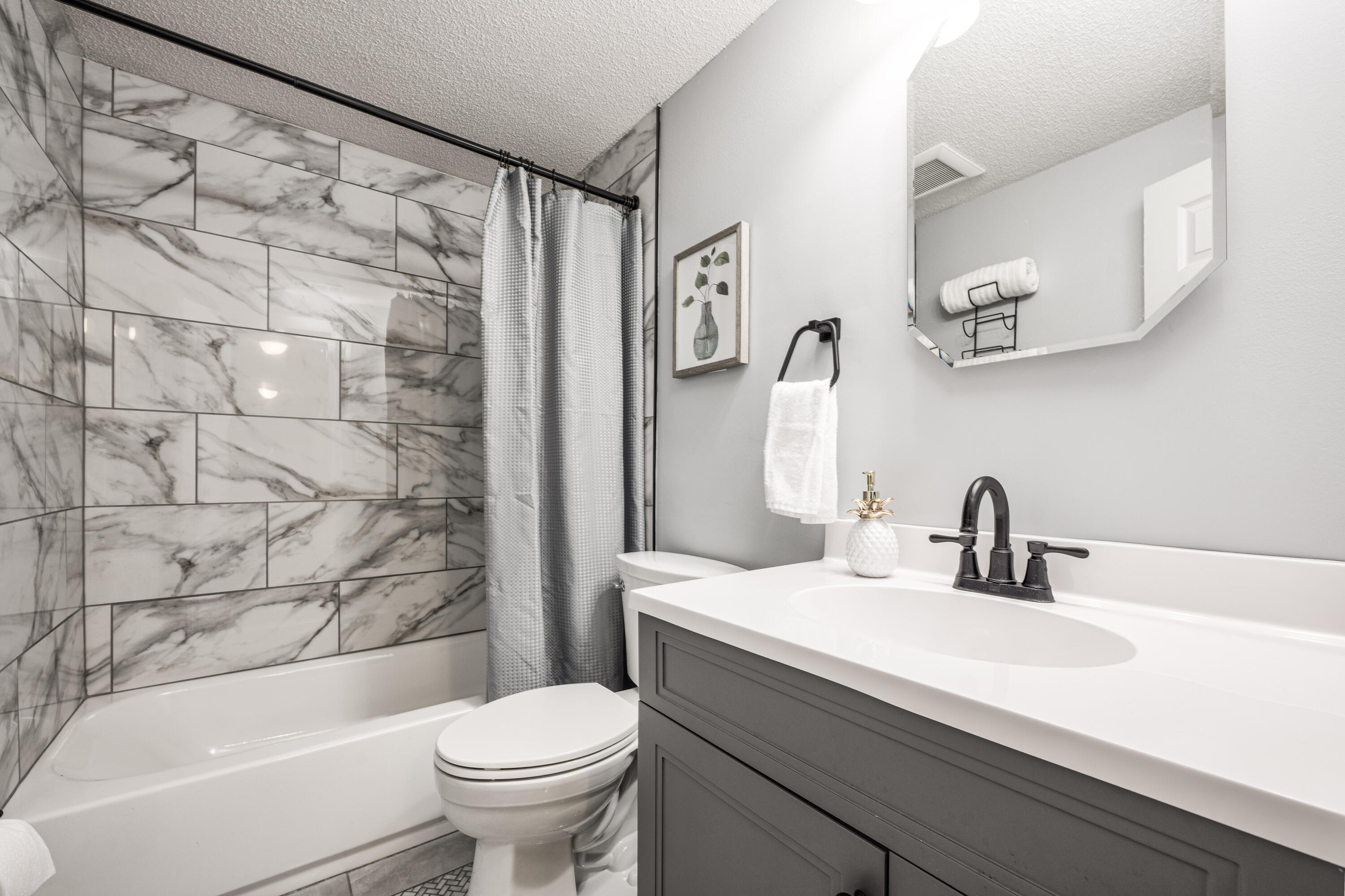 1838 Wadsworth Road Baker, FL 32531 - Photo 36 of 71 a bathroom with a sink toilet and shower