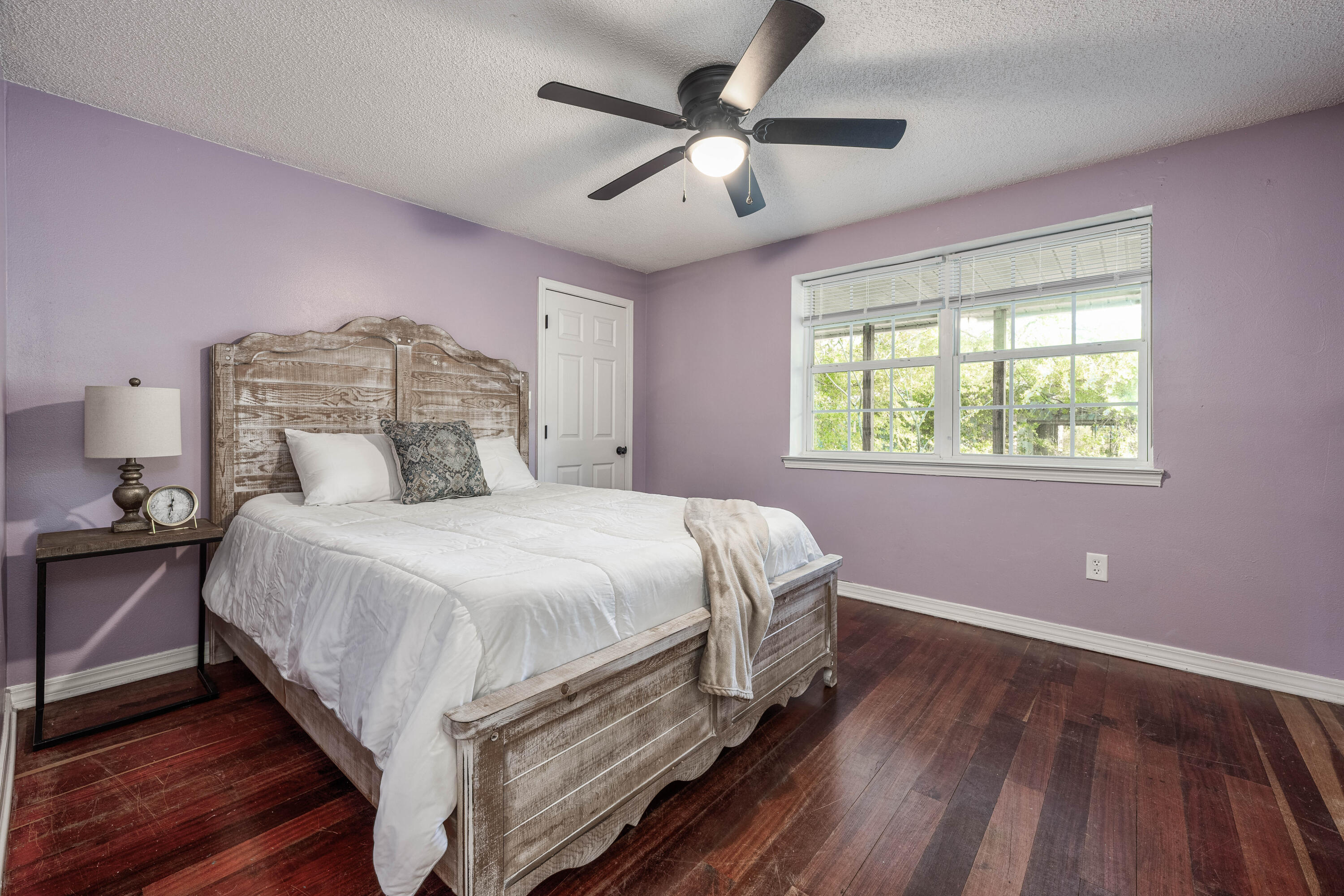 1838 Wadsworth Road Baker, FL 32531 - Photo 38 of 71 a bedroom with a bed and a ceiling fan