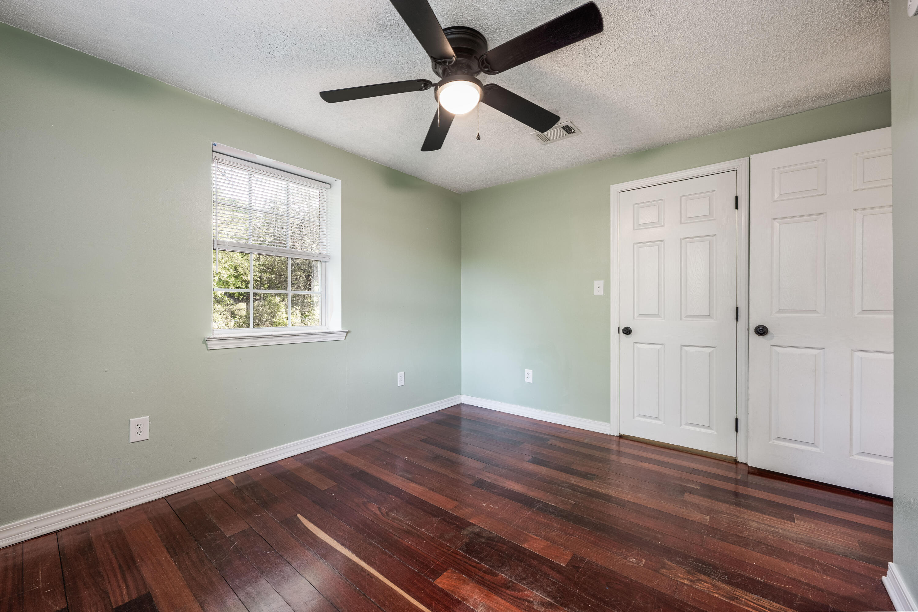 1838 Wadsworth Road Baker, FL 32531 - Photo 41 of 71 a view of room with hardwood floor and window