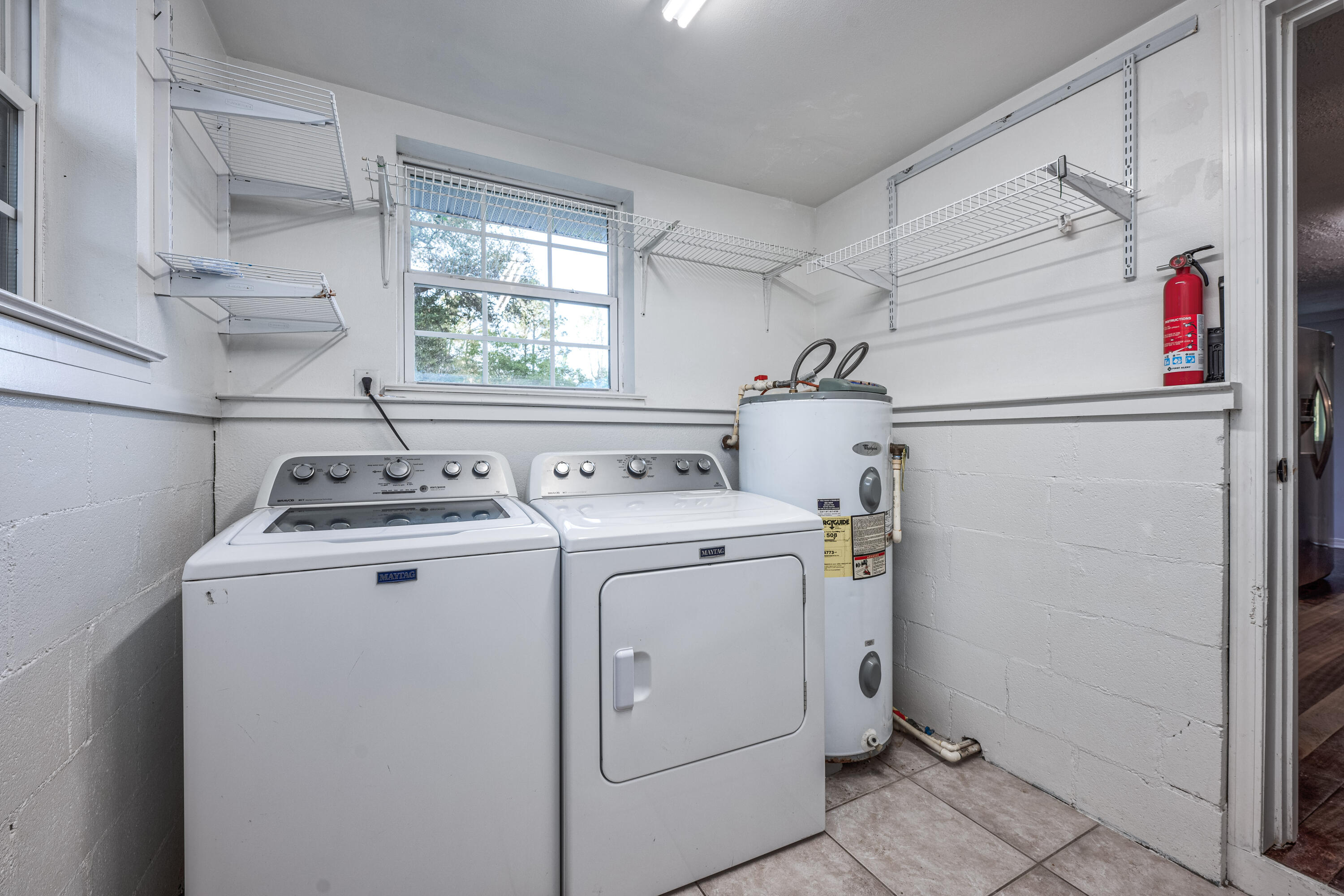 1838 Wadsworth Road Baker, FL 32531 - Photo 46 of 71 a utility room with dryer and washer