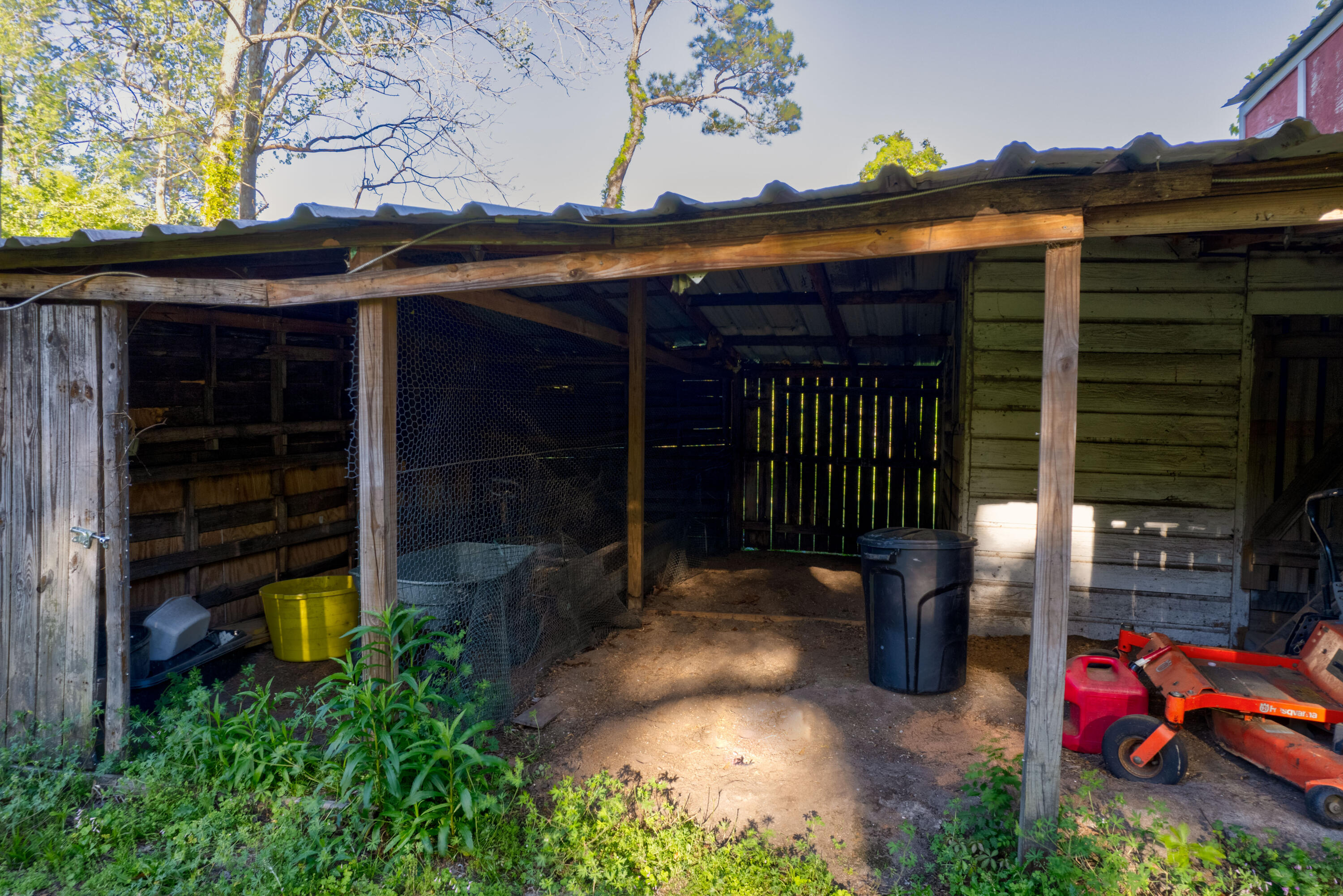 1838 Wadsworth Road Baker, FL 32531 - Photo 64 of 71 a backyard of a house with barbeque oven table and chairs