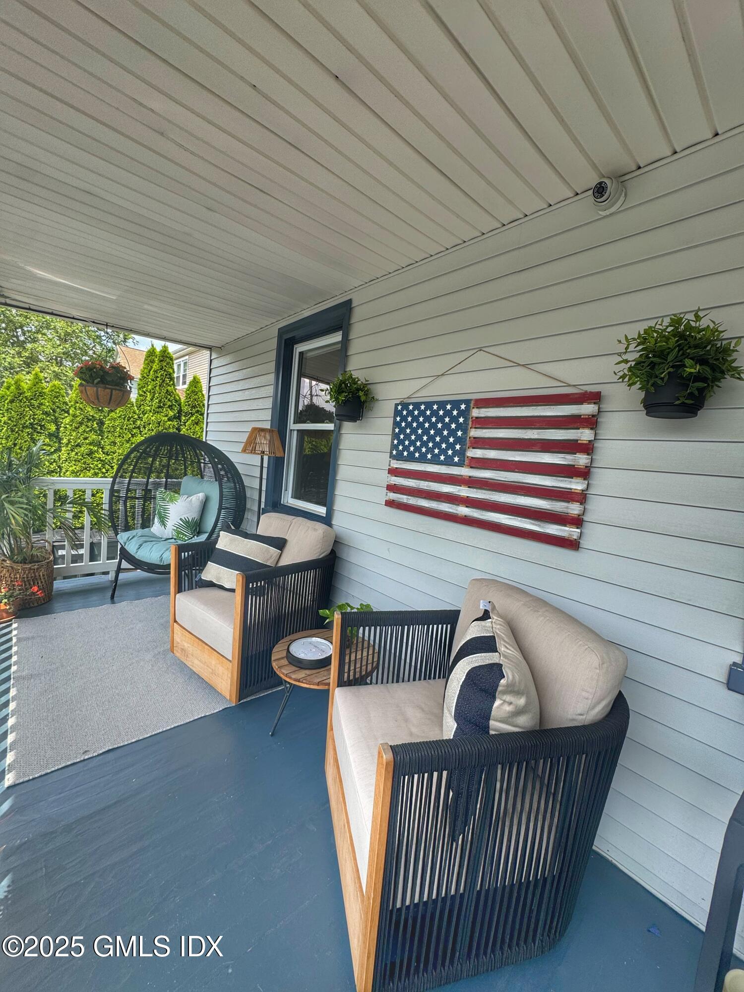 37 Gerry Street, Unit 1 Greenwich, CT 06830 - Photo 14 of 19 a balcony with furniture and a window