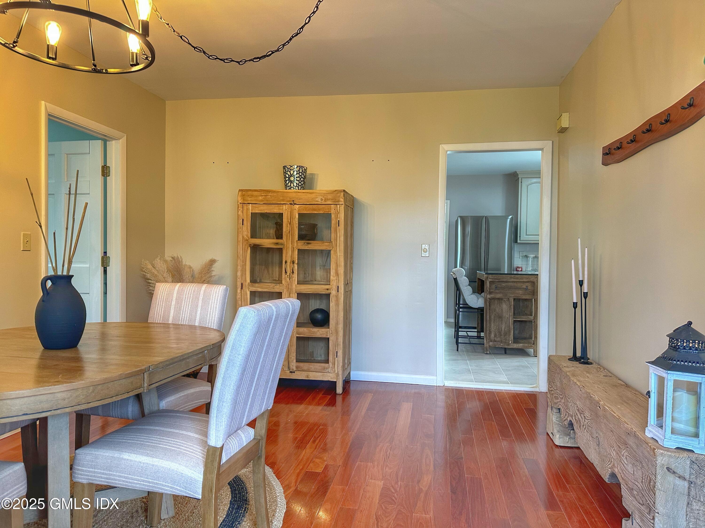 37 Gerry Street, Unit 1 Greenwich, CT 06830 - Photo 9 of 19 a workspace with furniture and wooden floor