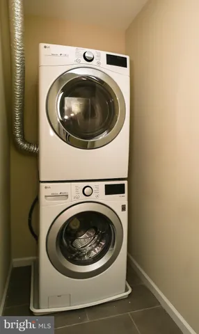 a bathroom with a toilet a sink and bathtub
