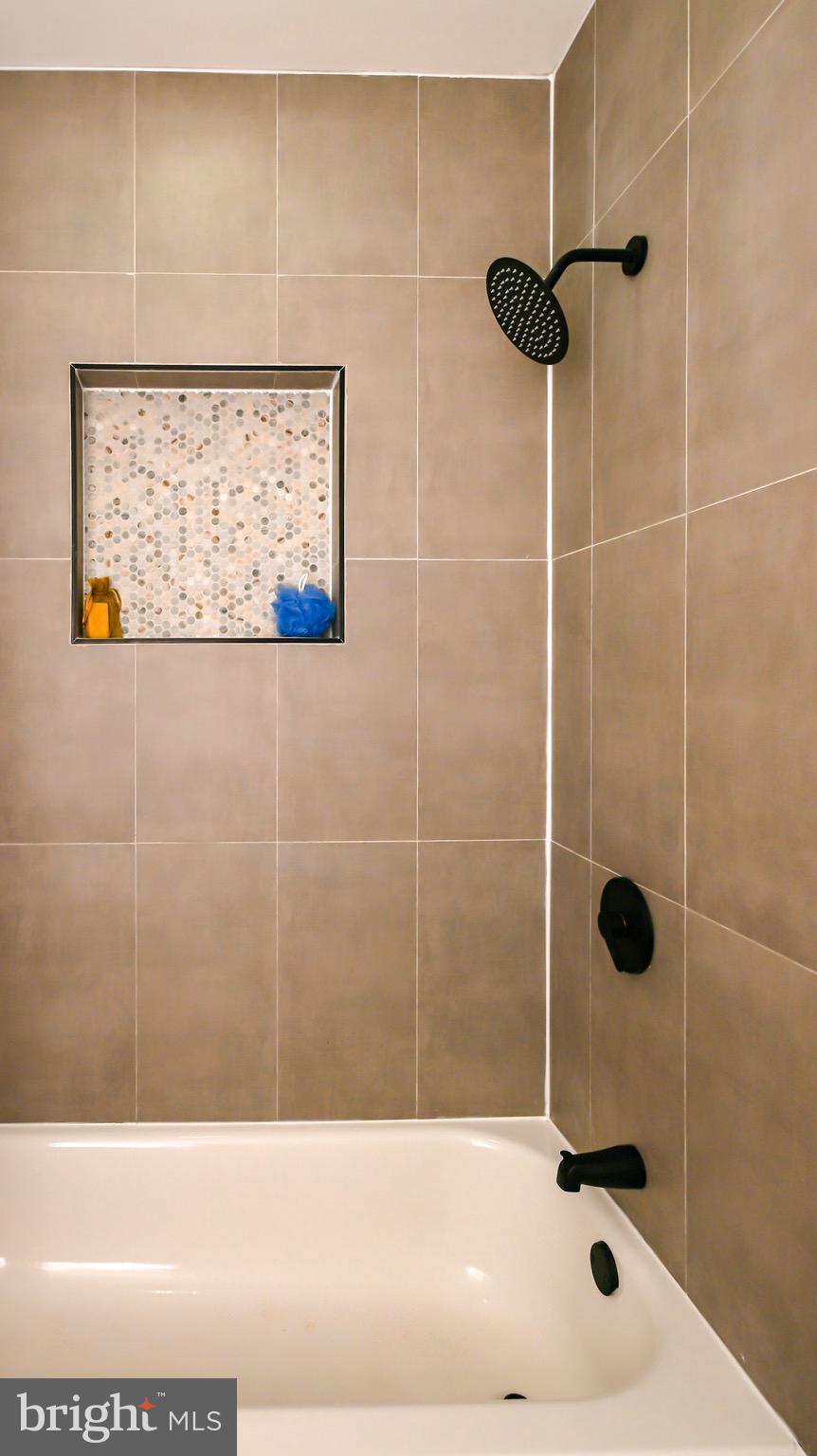 1743 Federal Street Baltimore, MD 21213 - Photo 25 of 42 a bathroom with a shower