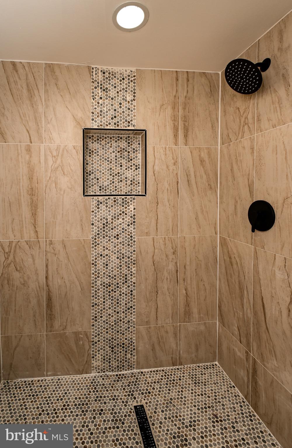 1743 Federal Street Baltimore, MD 21213 - Photo 30 of 42 a bathroom with a shower