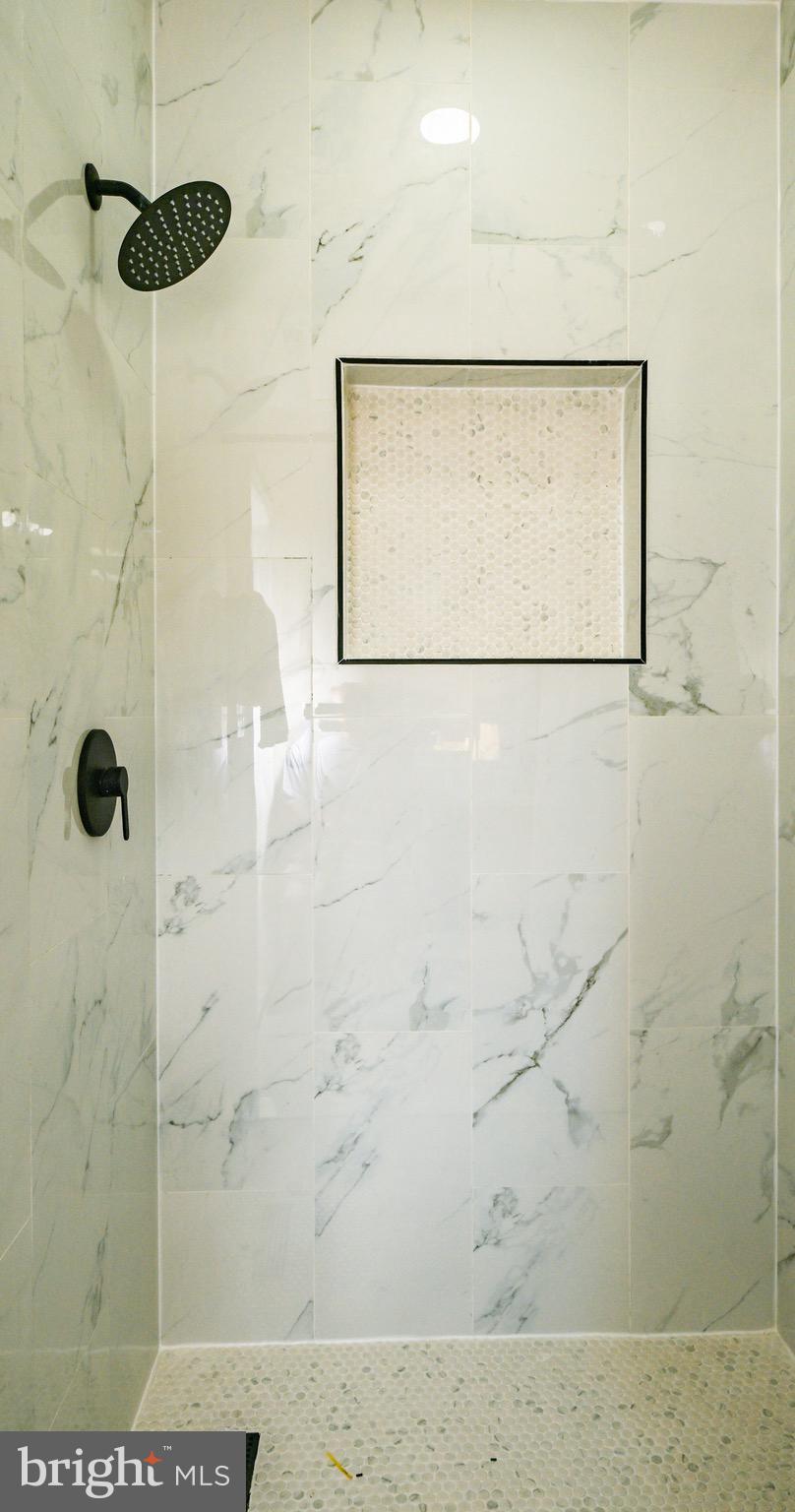 1743 Federal Street Baltimore, MD 21213 - Photo 10 of 42 a bathroom with a shower
