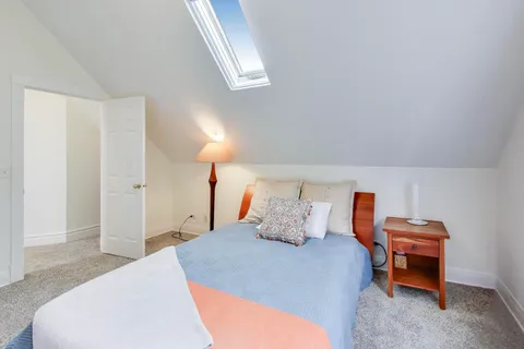 a room with furniture and flat screen tv