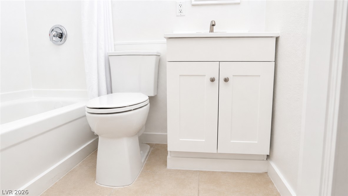 2870 South Sandhill Road Las Vegas, NV 89121 - Photo 47 of 64 A well-appointed bath with a classic white vanity and modern fixtures.