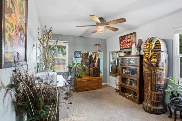 a view of a entryway with workspace and bedroom