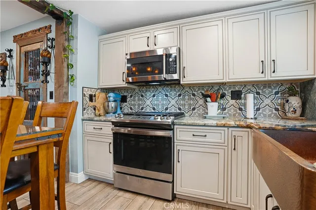 a view of swimming pool with a backyard