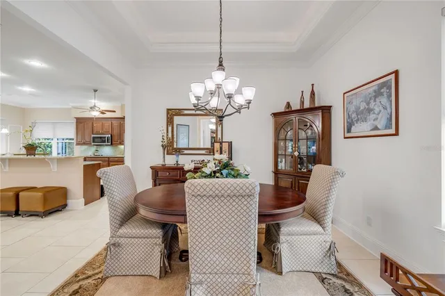 a spacious bathroom with a sink a large mirror and a bathtub