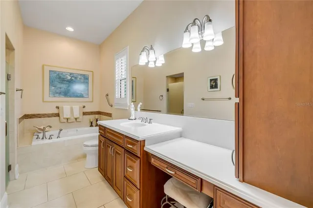 an aerial view of residential building and lake