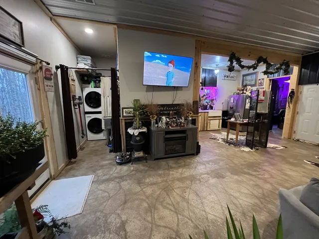 a kitchen with stainless steel appliances granite countertop a stove and cabinets