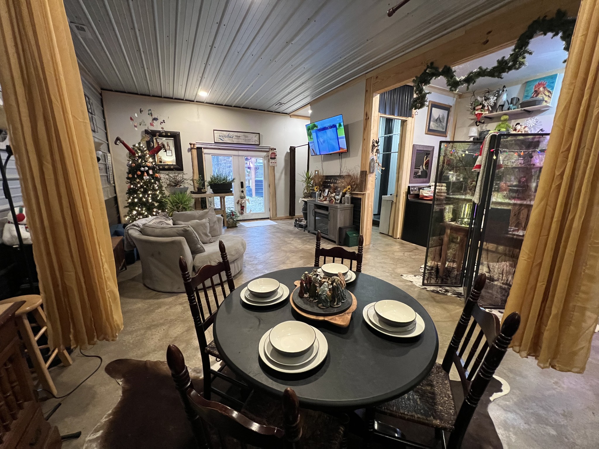 75 New Harmony Road Lafayette, TN 37083 - Photo 17 of 45 a view of a dining room with furniture and chandelier