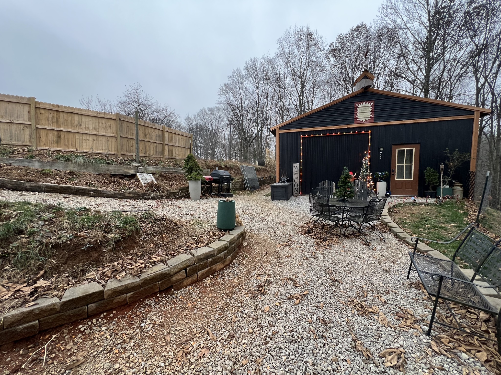 75 New Harmony Road Lafayette, TN 37083 - Photo 4 of 45 a front view of a house with outdoor seating