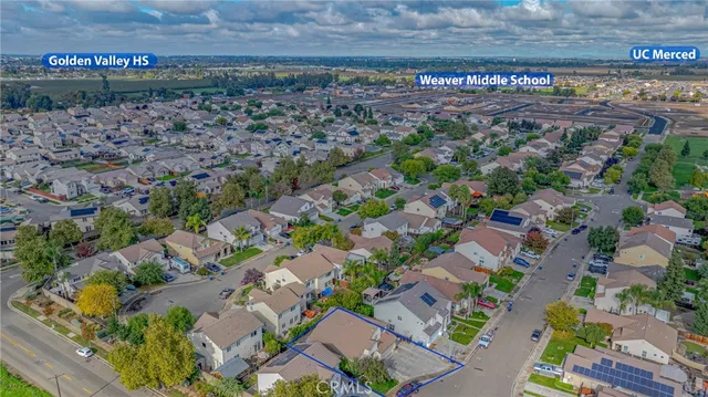 a view of a street with a park
