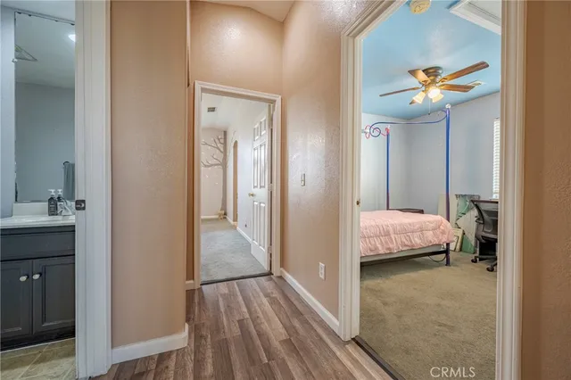 a en suite bathroom with a sink and a mirror