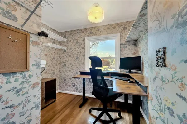a bed room with a bed and a fireplace