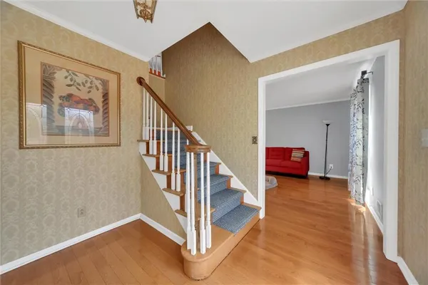 a view of a hallway with staircase