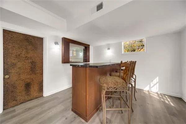 a view of room with racks on the wall