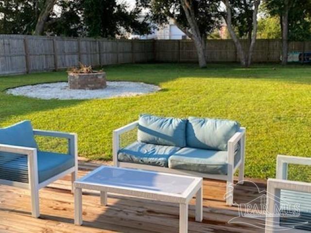 5845 Fairlands Road Milton, FL 32583 - Photo 2 of 21 a view of a backyard with plants
