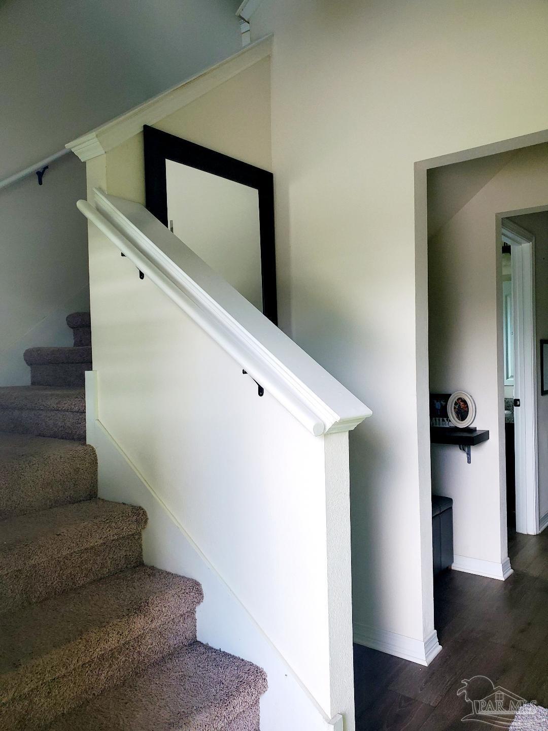 5845 Fairlands Road Milton, FL 32583 - Photo 3 of 21 a view of entryway and hall with wooden floor