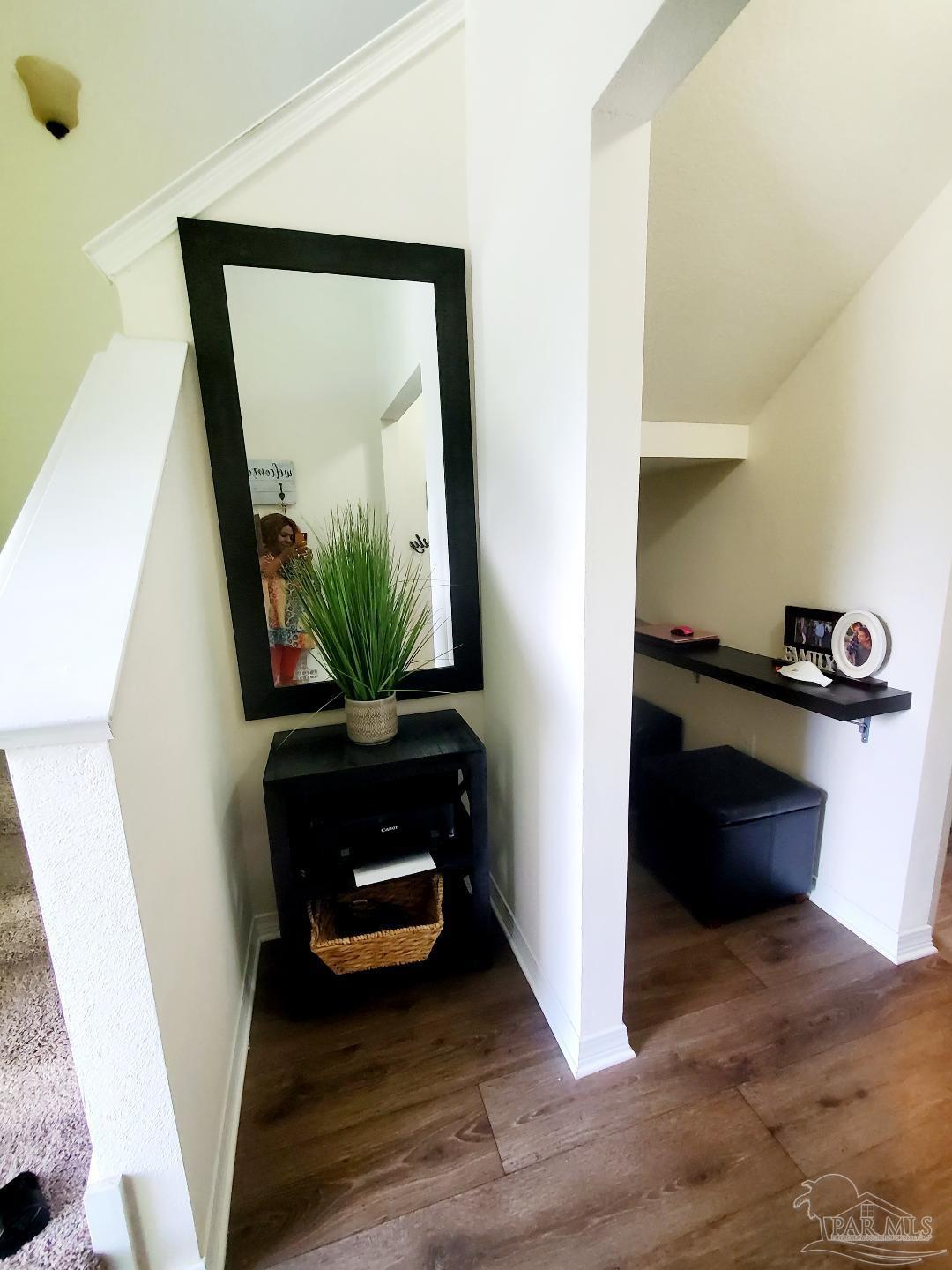 5845 Fairlands Road Milton, FL 32583 - Photo 4 of 21 a living room with furniture and a flat screen tv