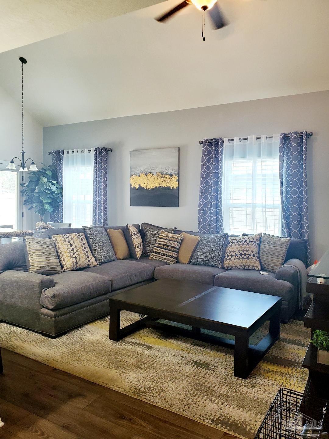 5845 Fairlands Road Milton, FL 32583 - Photo 9 of 21 a living room with furniture and a window