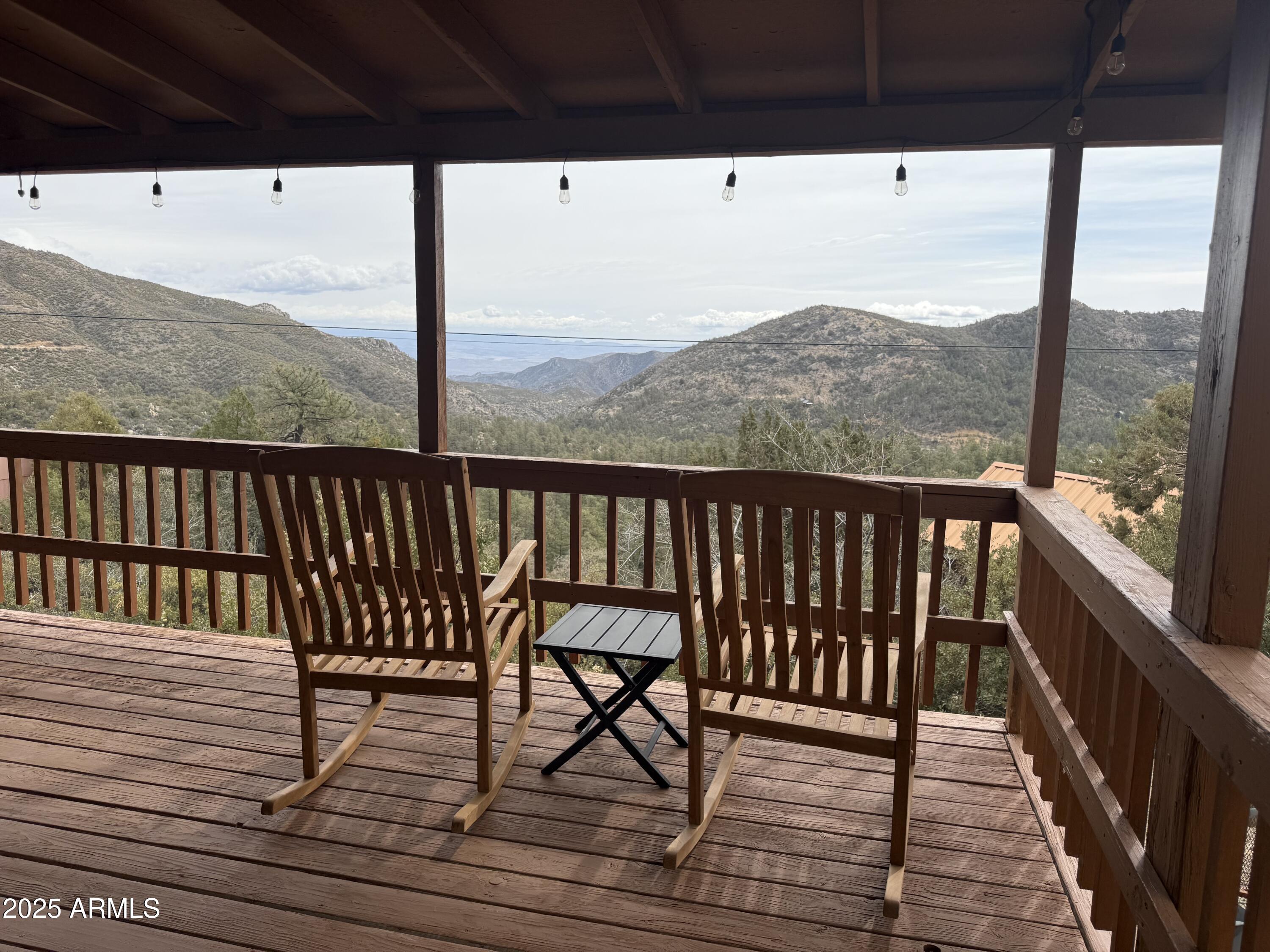 23442 Manzanita Road Crown King, AZ 86343 - Photo 13 of 41 a view of balcony with furniture